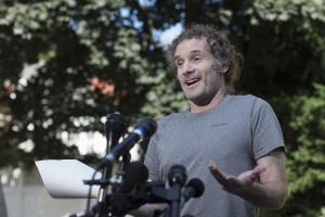 Peter Theo Curtis, who was released on Sunday from years in captivity of insurgents in Syria, talks to reporters near mother's home in Cambridge