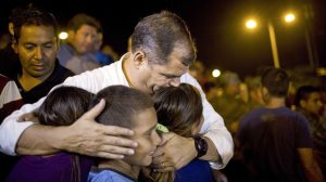 Ecuador's President, Rafael Correa, kisses a group of children after meeting with local authorities in the emergency center in Portoviejo, Ecuador, Sunday, April 17, 2016. The strongest earthquake to hit Ecuador in decades flattened buildings and buckled highways along its Pacific coast, sending the Andean nation into a state of emergency. (AP Photo/Rodrigo Abd)